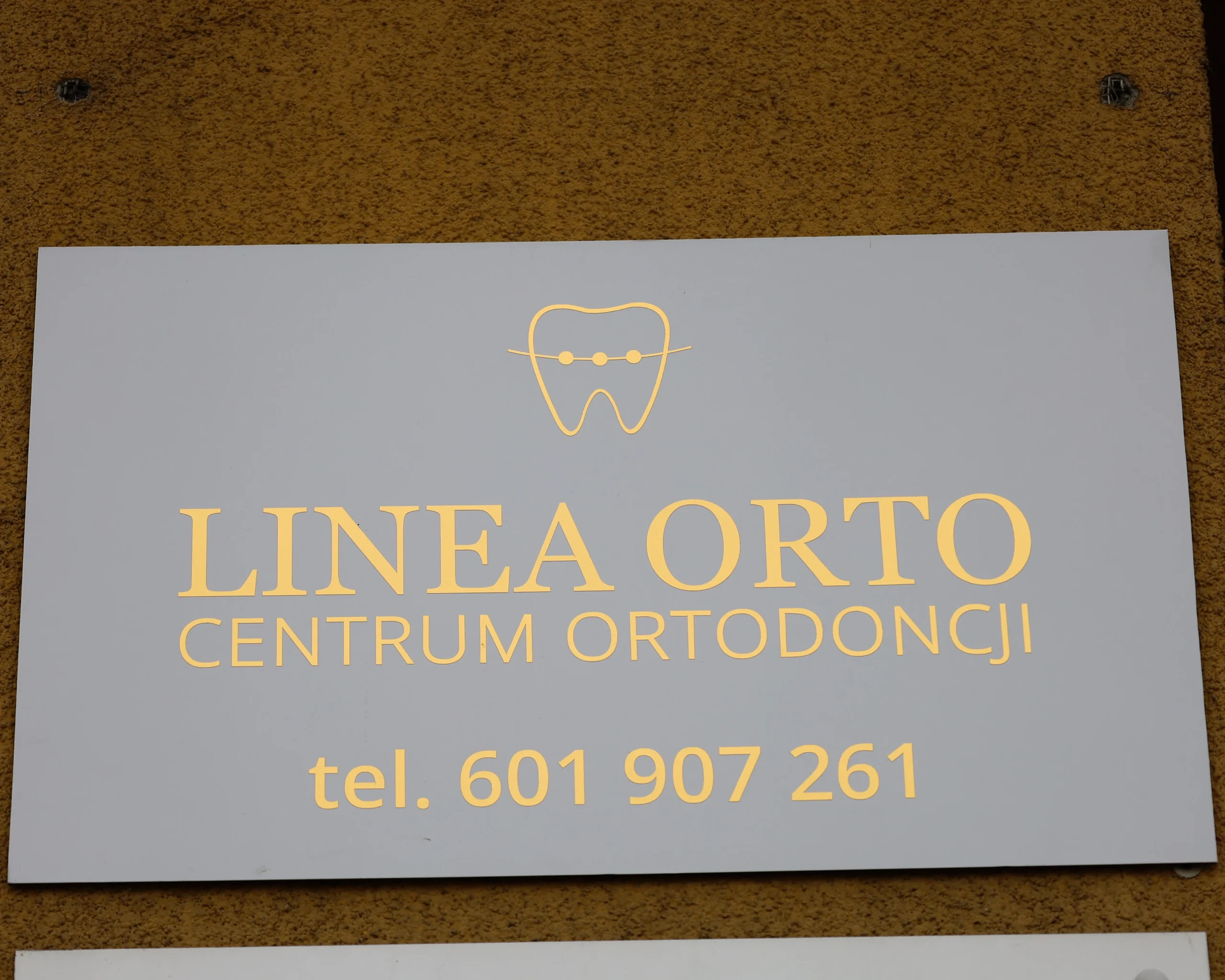 linea-orto-tabliczka
